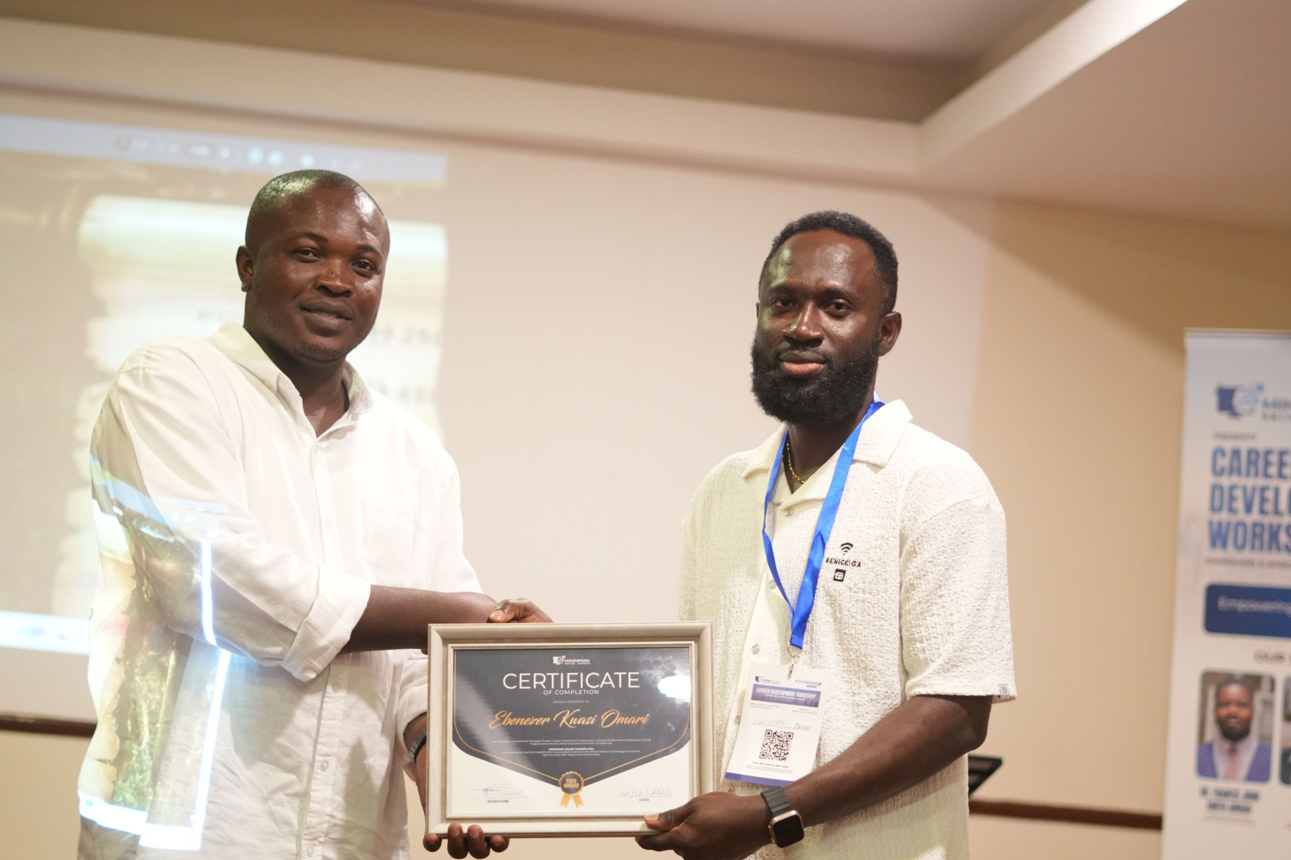 Mr Omane Recieving His Certificate